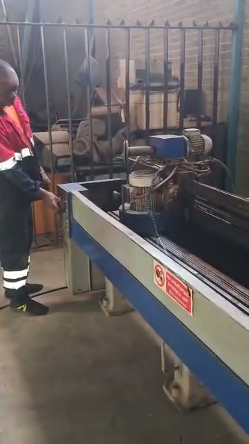 Metal cutting saw station in the fabrication shop